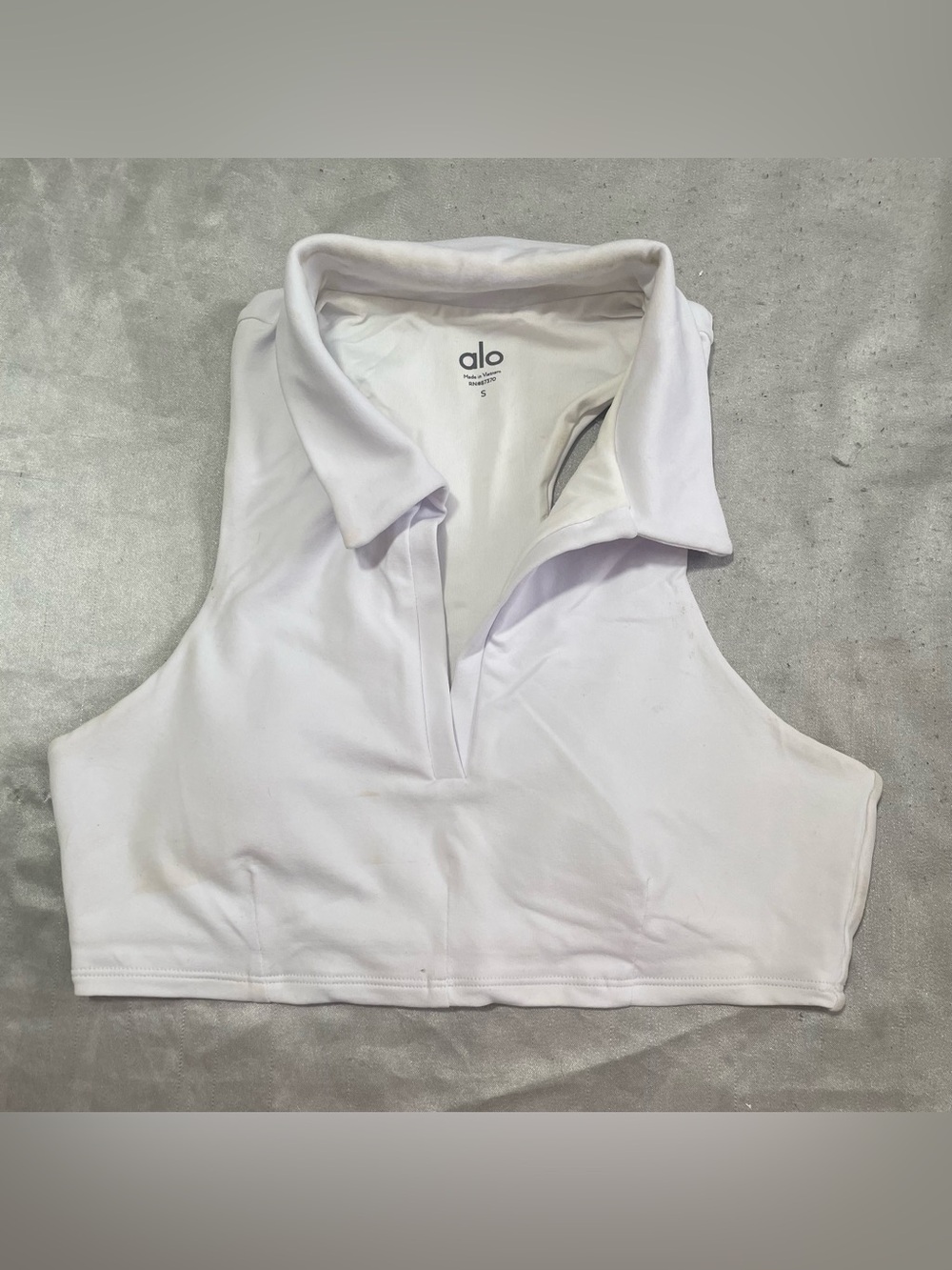 ALO Yoga White Sleeveless Collared V-Neck Crop Top